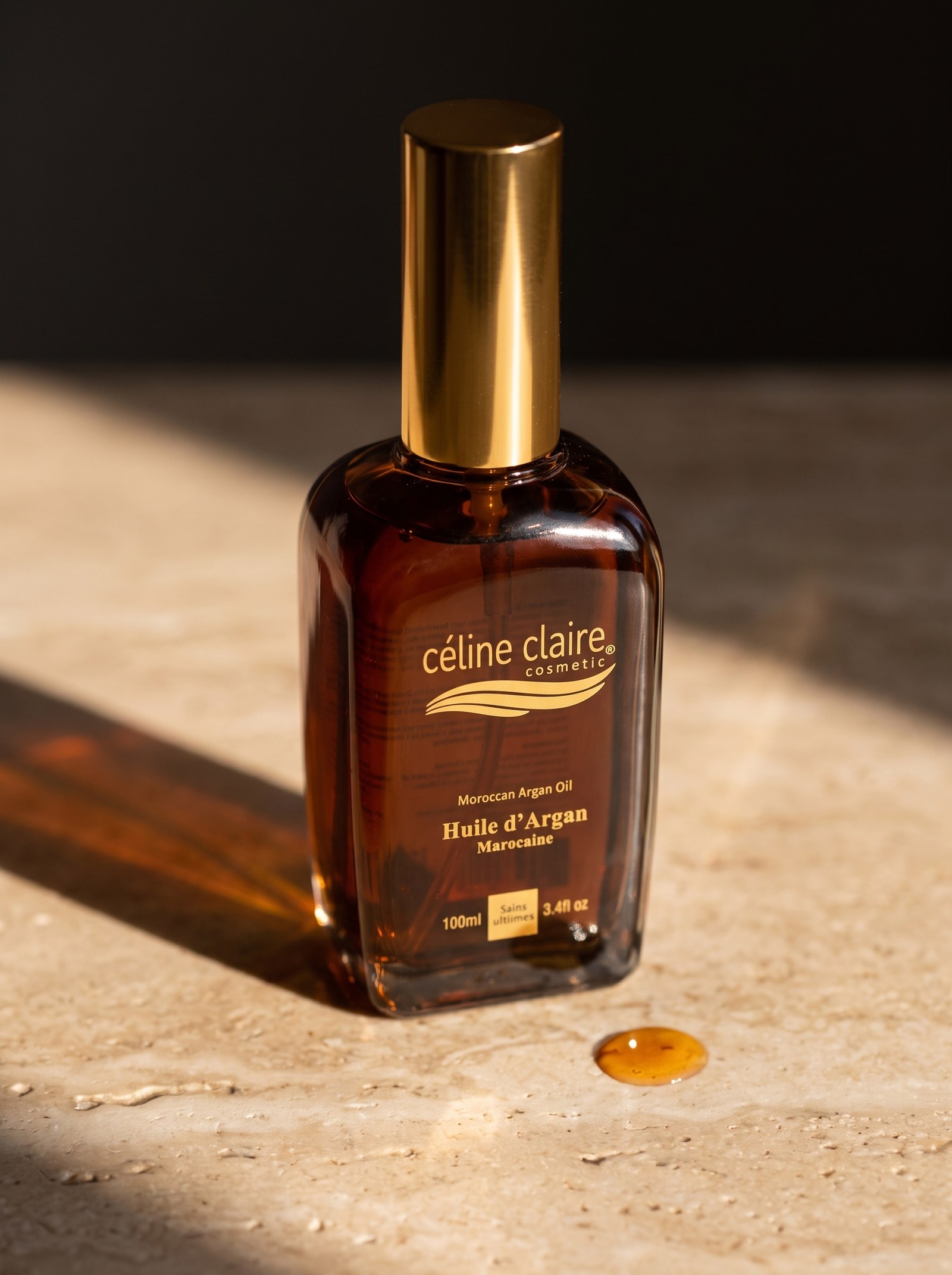 Céline Claire Moroccan Argan Oil bottle — 100 ml dark amber glass, gold cap