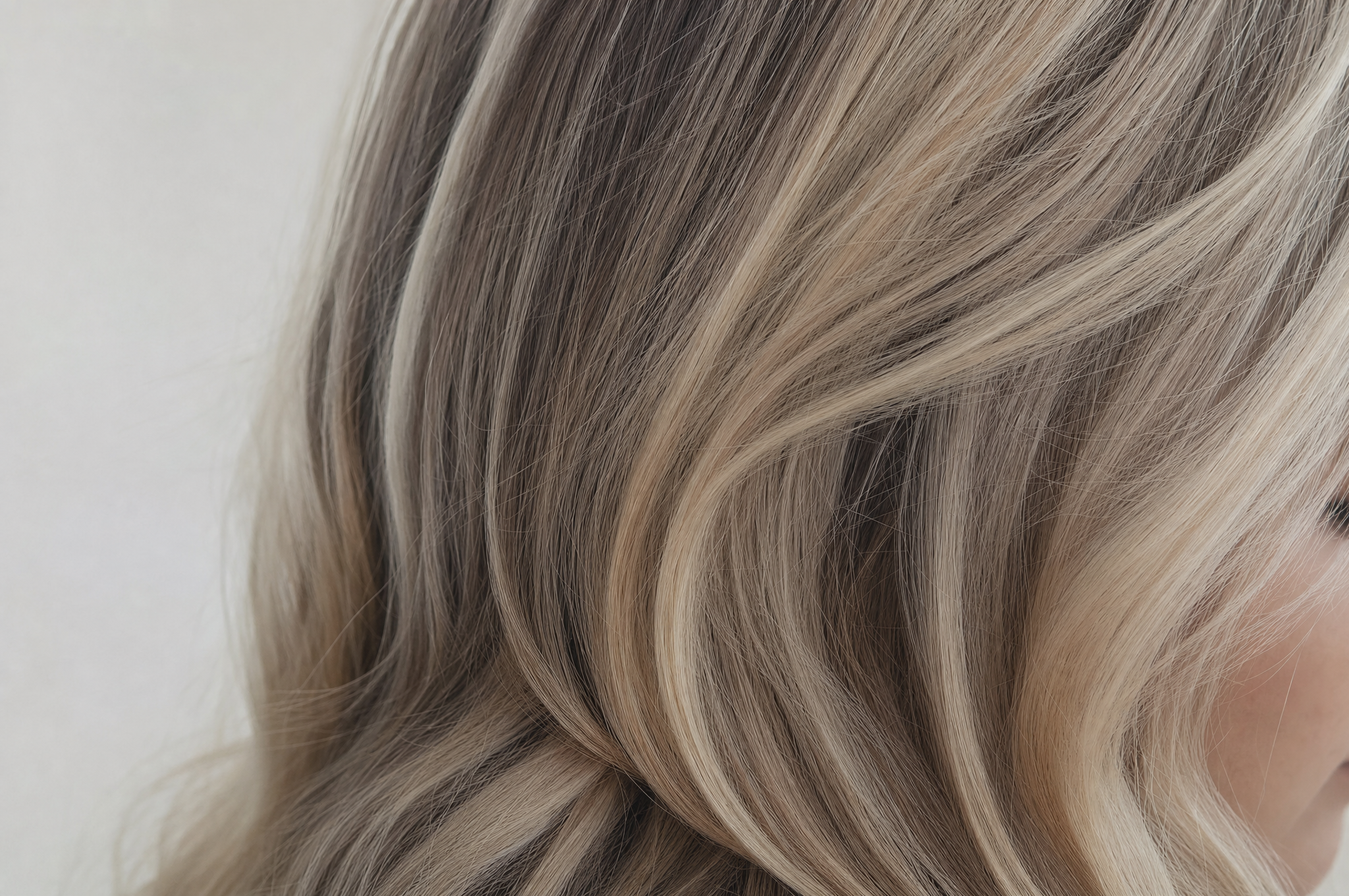 Blonde and silver highlighted strands with tonal dimension